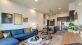 a living room with a blue couch