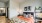 a bedroom with a bed and a table