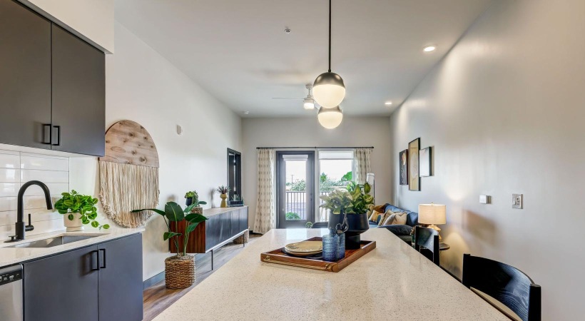 Generous living spaces to relax and unwind a kitchen with a marble island