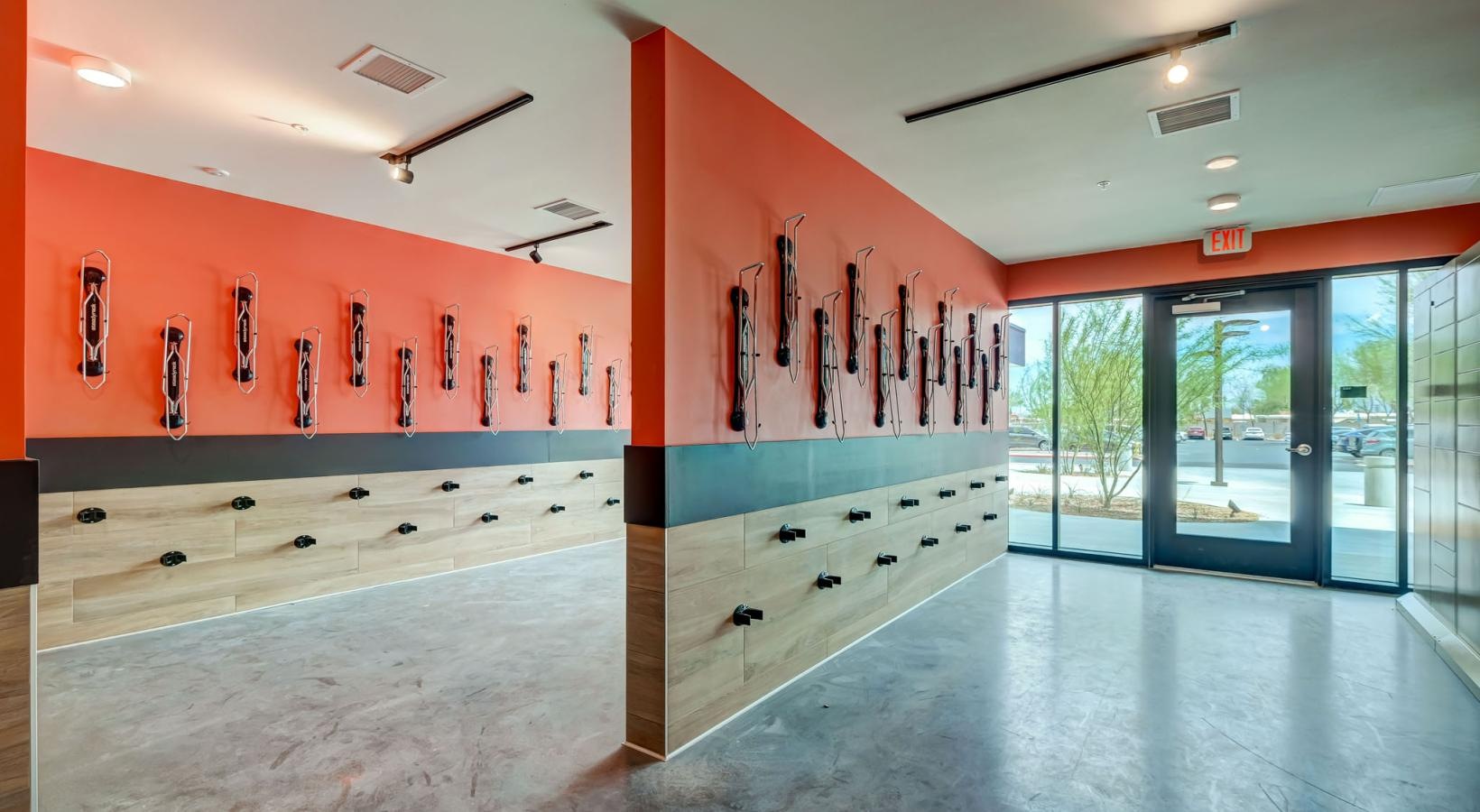Cutting-edge amenities at your fingertips a room with orange walls and glass windows