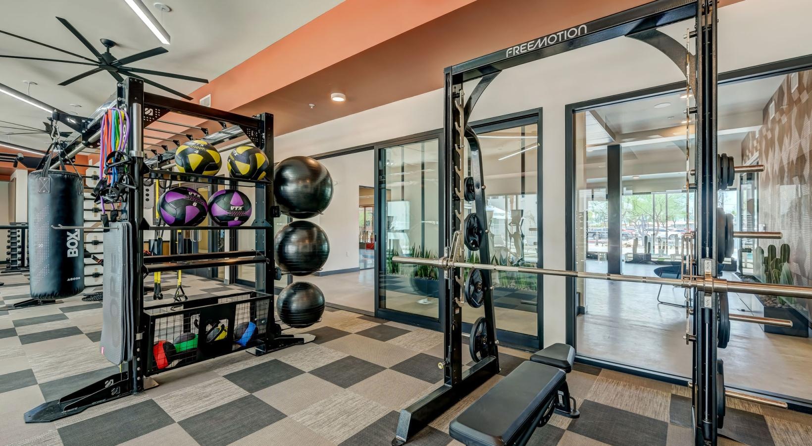 Take advantage of all The Pomeroy has to offer a gym with glass doors and a bench in it