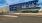 a large building with a parking lot