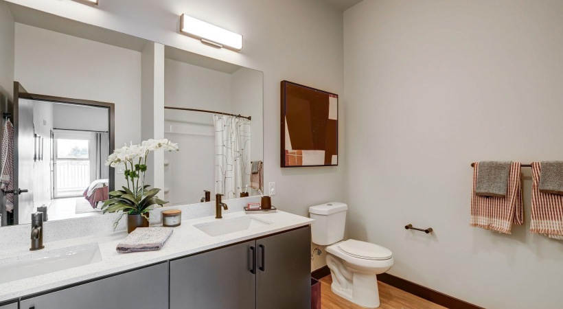a bathroom with a large mirror