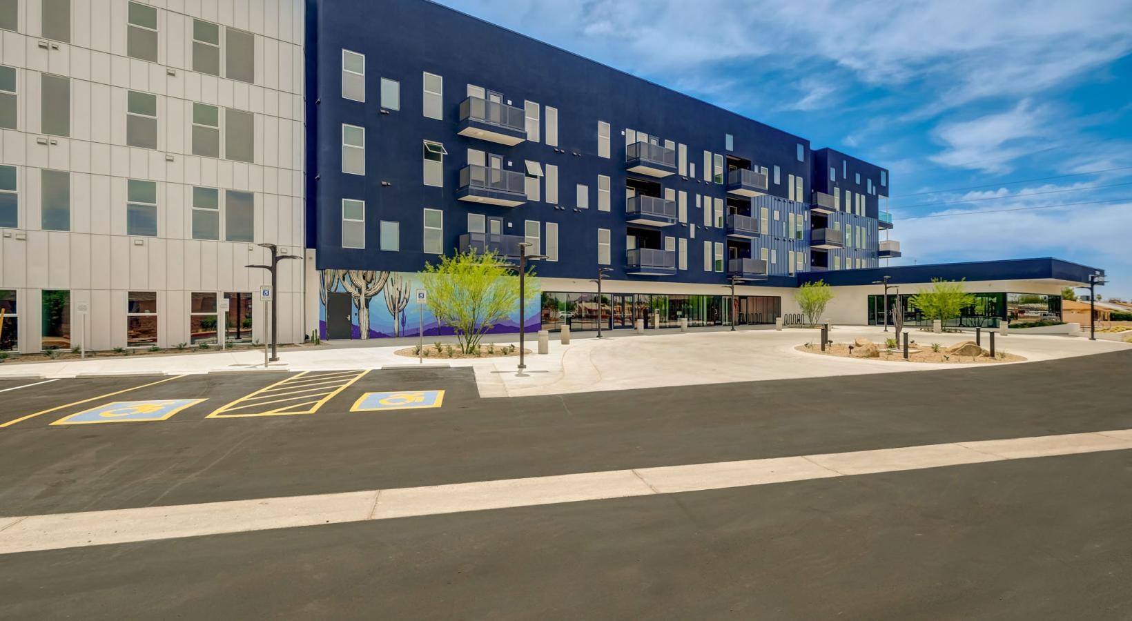 The essence of exceptional living a building with a parking lot