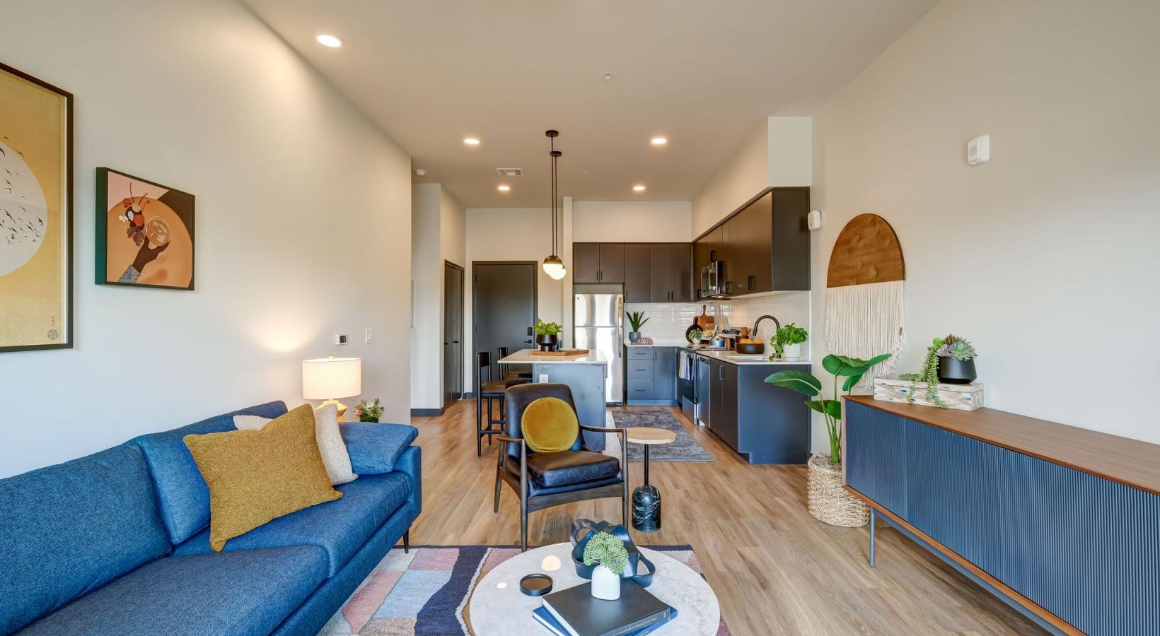 Beautiful living areas to match your lifestyle a living room with a blue couch